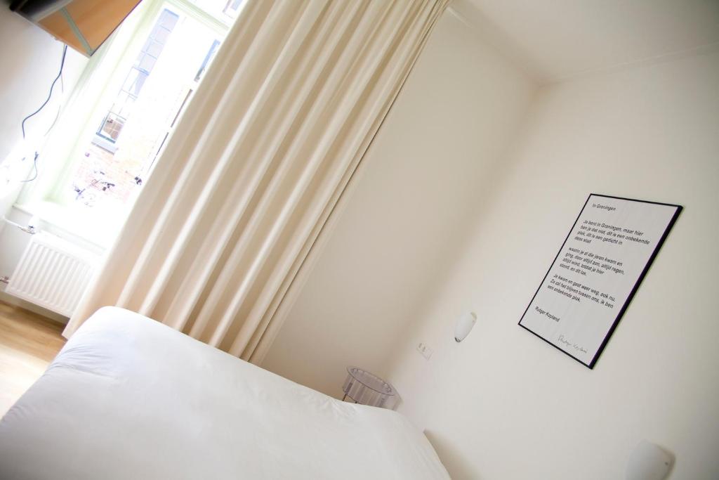 Postel nebo postele na pokoji v ubytování Gelkingehof Aparthotel