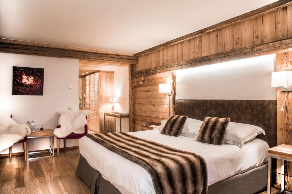 Cama ou camas em um quarto em Au Coeur du Village