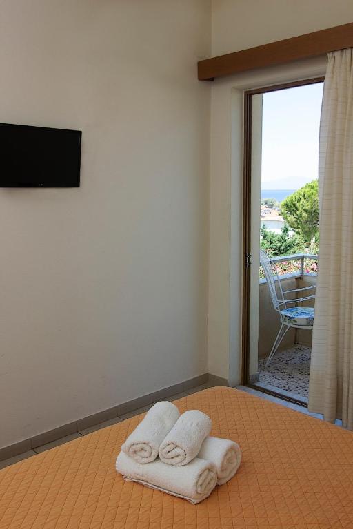 Postel nebo postele na pokoji v ubytování HOTEL STOUPA