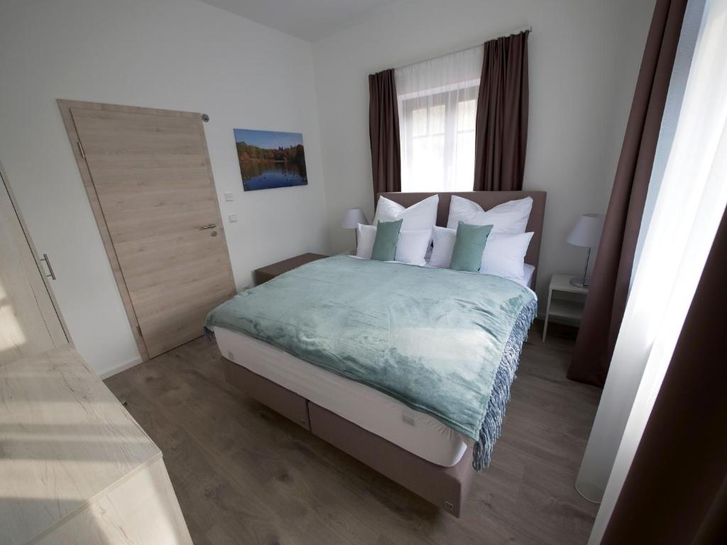 Postel nebo postele na pokoji v ubytování Oberwaldhaus