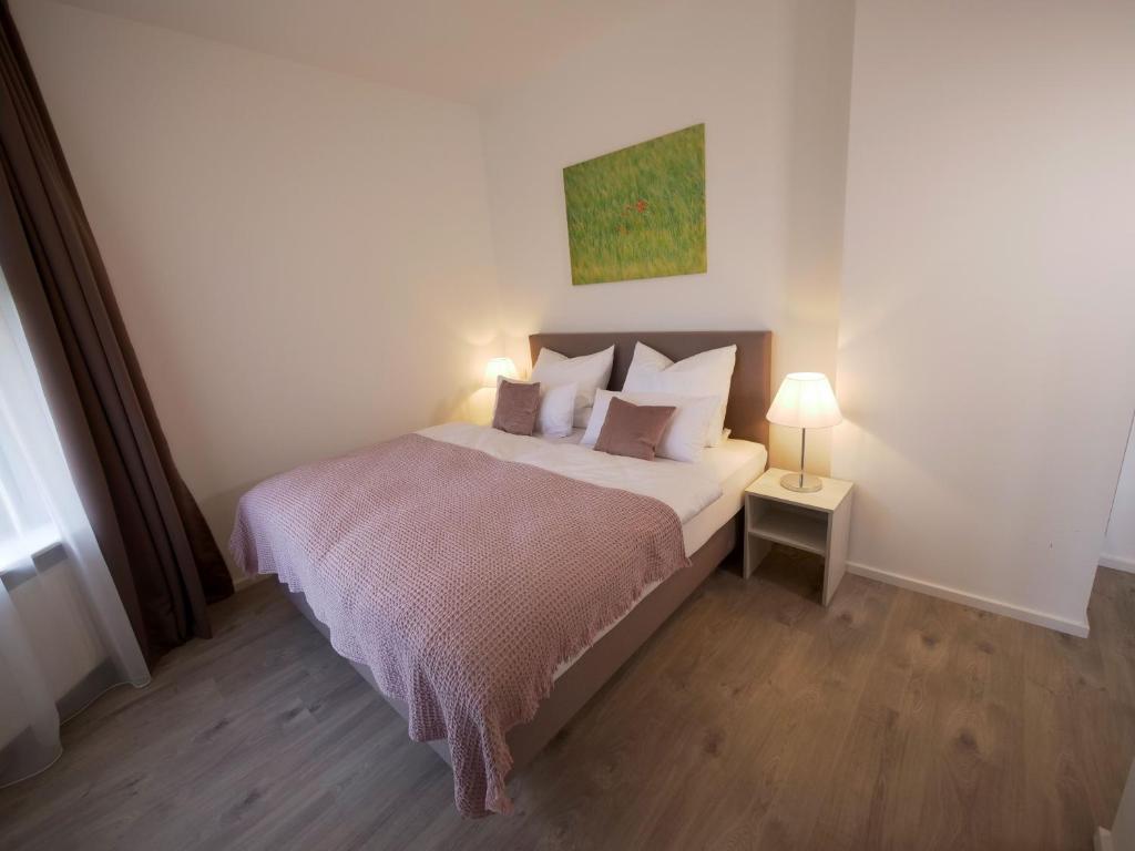 Postel nebo postele na pokoji v ubytování Oberwaldhaus