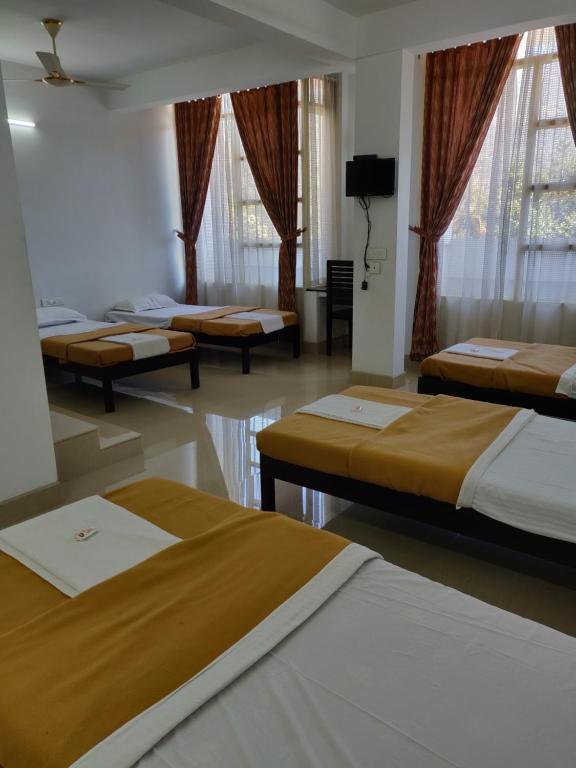 Postel nebo postele na pokoji v ubytování M3 Homes