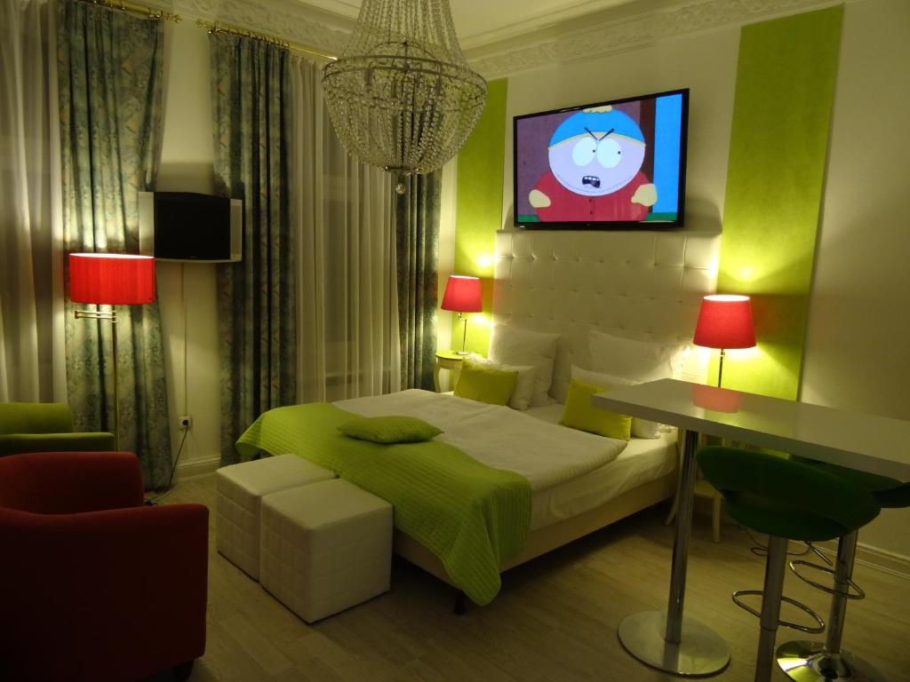 Postel nebo postele na pokoji v ubytování Boulevard Hotel Hamburg