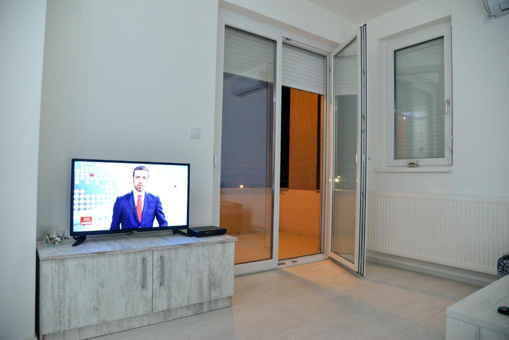 TV a/nebo společenská místnost v ubytování BEST Apartments