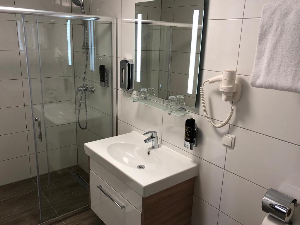 Koupelna v ubytování Hotel König