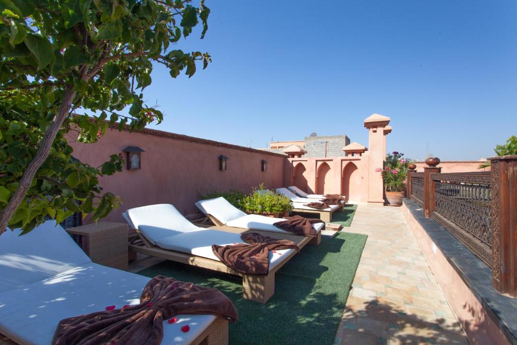 Posezení v ubytování Riad Le Perroquet Bleu Suites & Spa