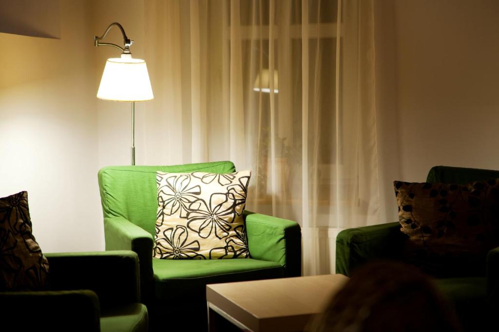 Posezení v ubytování Pytloun Wellness Travel Hotel