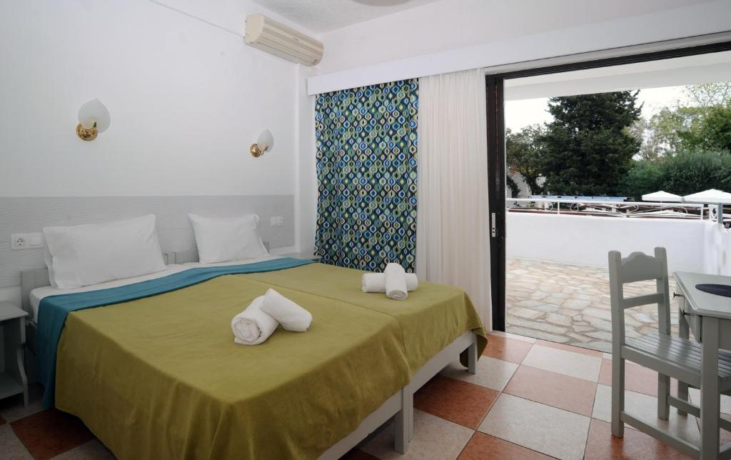 Postel nebo postele na pokoji v ubytování Katia Beach Hotel
