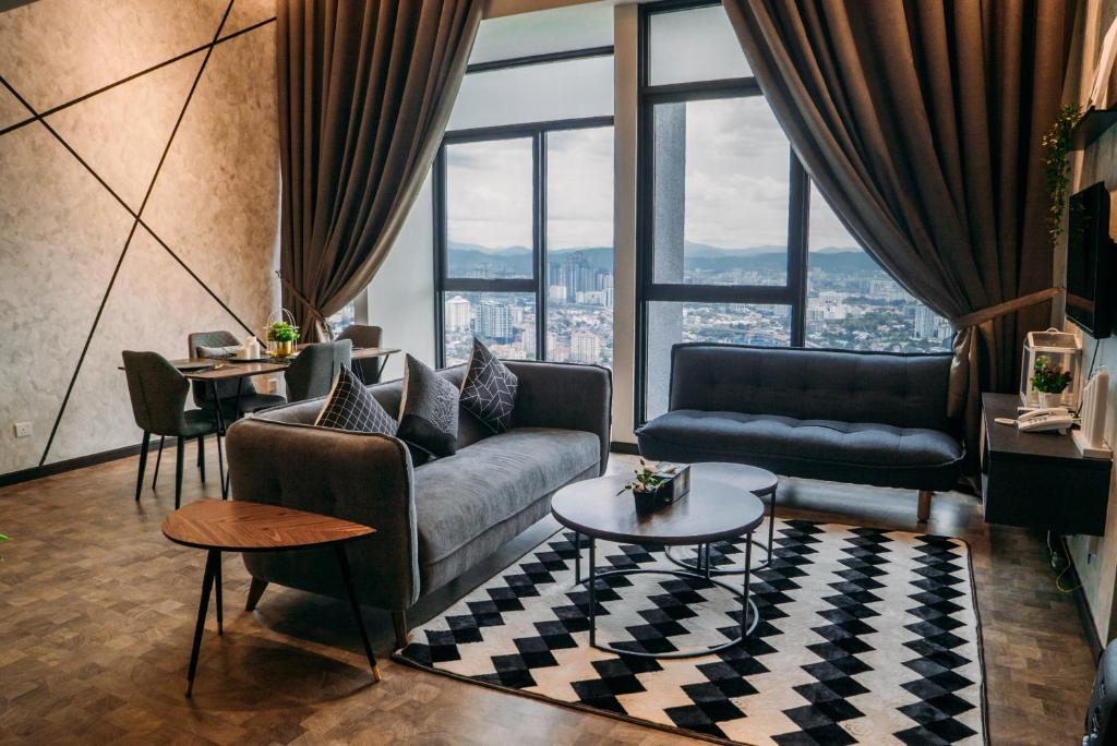 Posezení v ubytování Expressionz Suites By iHost Global