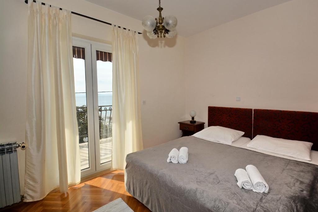Posteľ alebo postele v izbe v ubytovaní Guesthouse Kamen Kuća