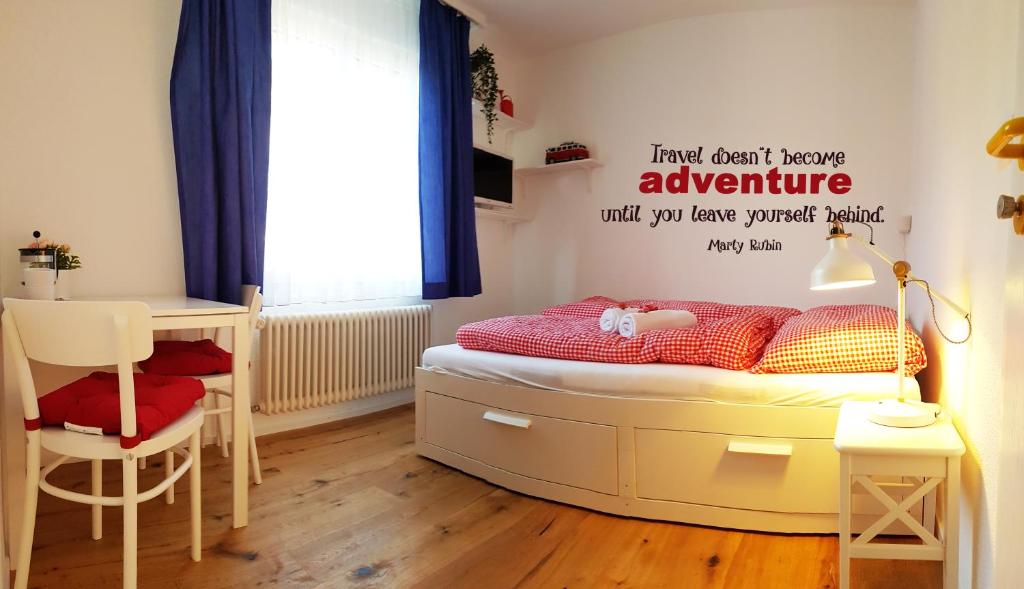 Postel nebo postele na pokoji v ubytování Adventure Guesthouse Interlaken