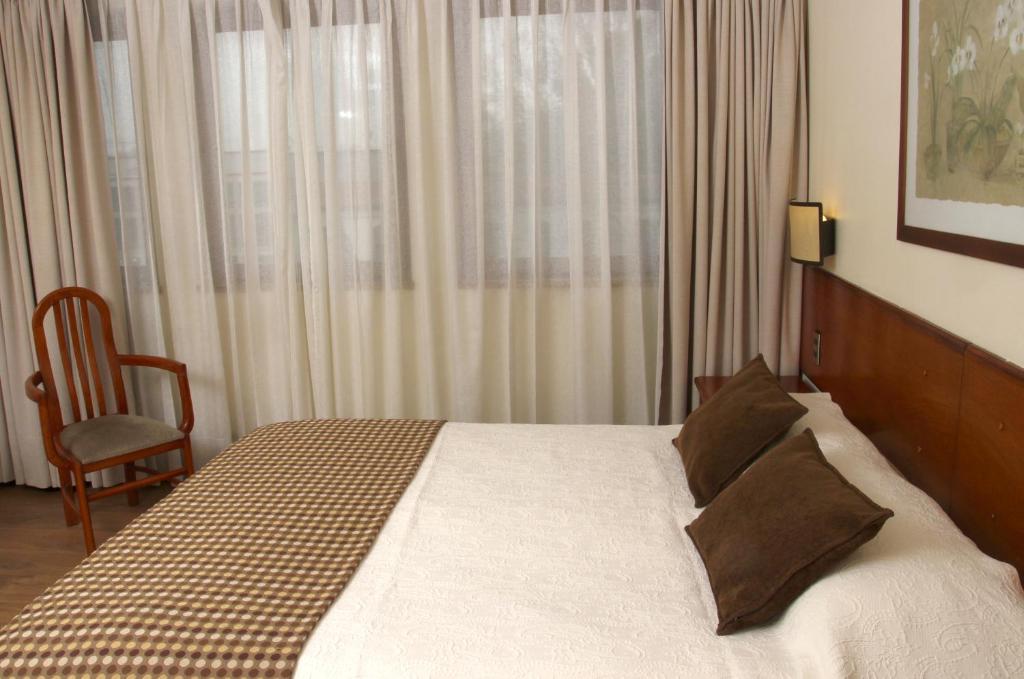Postel nebo postele na pokoji v ubytování Tur Hotel Santiago