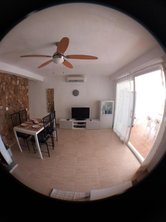 Televízia a/alebo spoločenská miestnosť v ubytovaní Fantástico Apartamento 1ª Línea de Playa