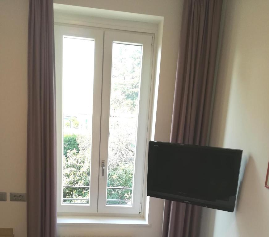 TV a/nebo společenská místnost v ubytování Hotel Quarcino