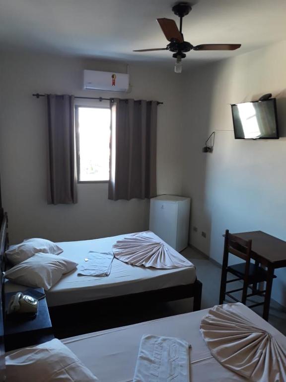 Postel nebo postele na pokoji v ubytování HOTEL LAREIRA