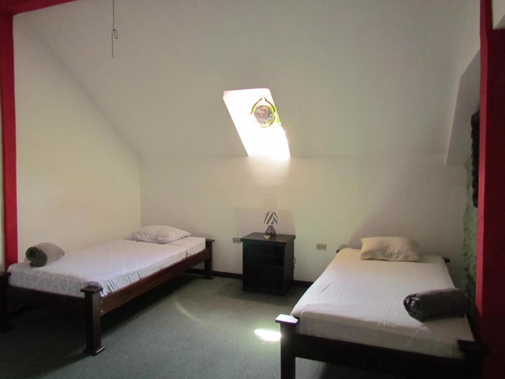 Cama o camas de una habitación en Hostel Shakti