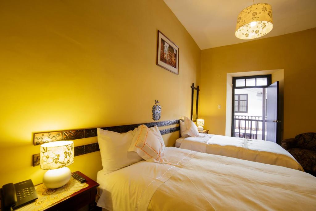 Ένα ή περισσότερα κρεβάτια σε δωμάτιο στο Yabar Hotel Plaza