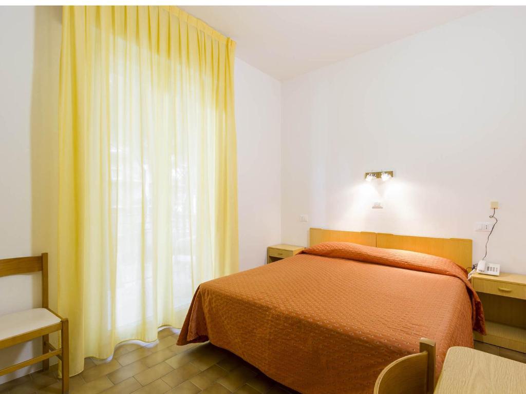 Postel nebo postele na pokoji v ubytování Hotel Meris