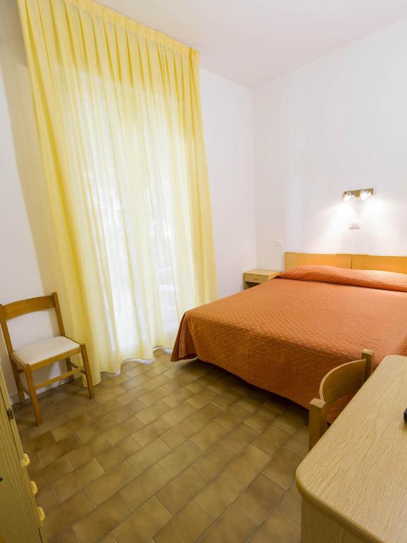 Postel nebo postele na pokoji v ubytování Hotel Meris