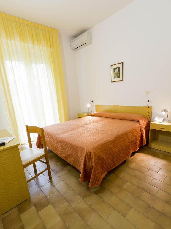 Postel nebo postele na pokoji v ubytování Hotel Meris