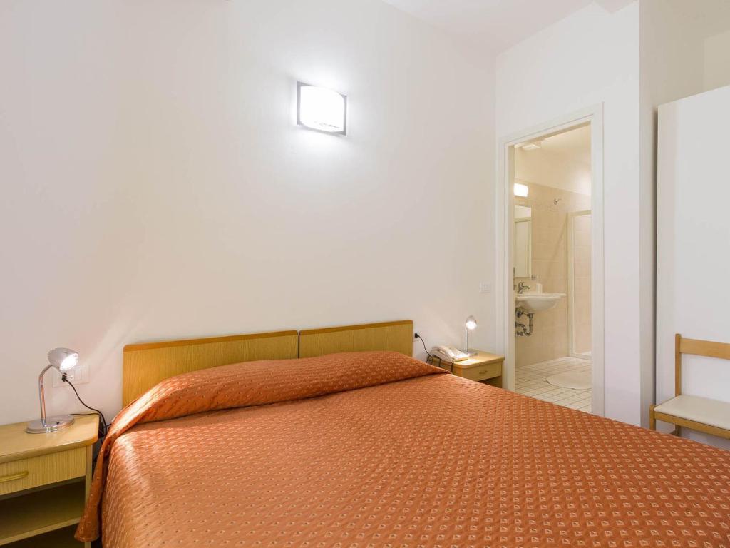 Postel nebo postele na pokoji v ubytování Hotel Meris