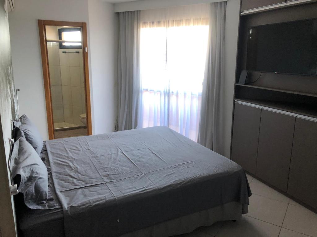 Postel nebo postele na pokoji v ubytování Studio particular em Hotel