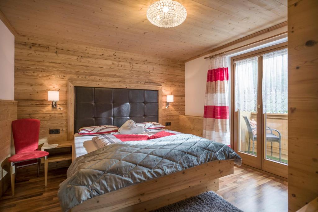 Postel nebo postele na pokoji v ubytování Appartements Enzian