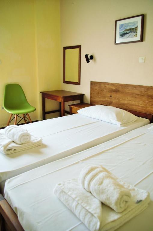 Postel nebo postele na pokoji v ubytování Sotiras Rooms