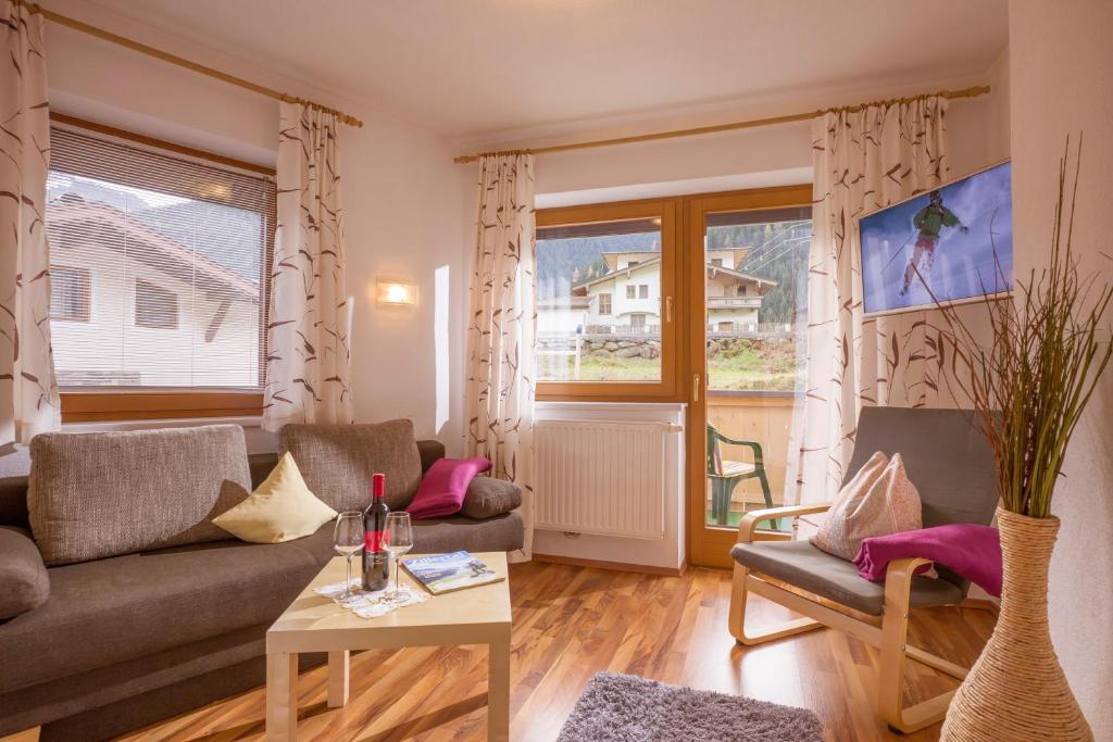 Posezení v ubytování Appartements Enzian