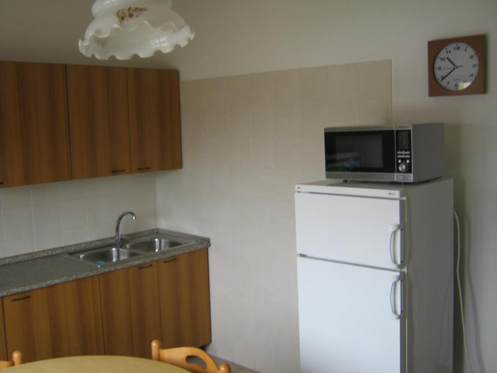 A kitchen or kitchenette at Casa Armanda