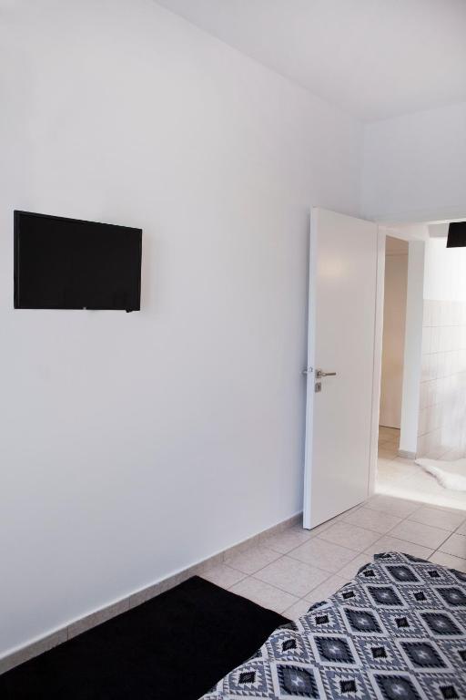 Posteľ alebo postele v izbe v ubytovaní Best located executive apartment in Maroussi.