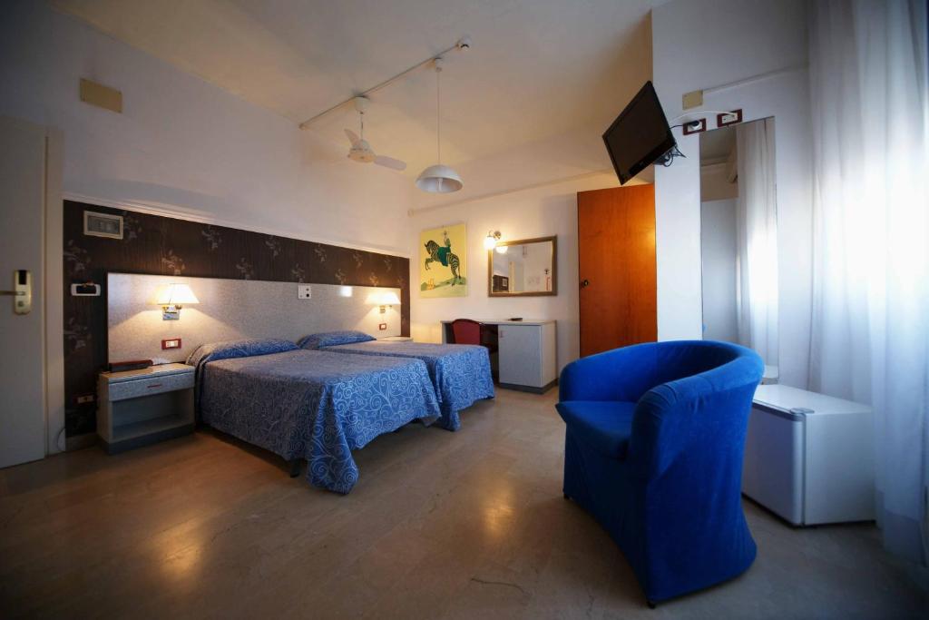 Postel nebo postele na pokoji v ubytování Hotel Liberty