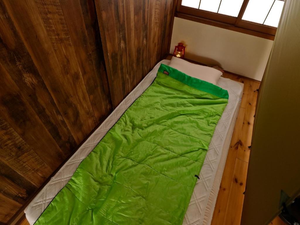 Postel nebo postele na pokoji v ubytování Inn the Camp