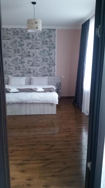 Letto o letti in una camera di Guesthouse Elli & Cottages