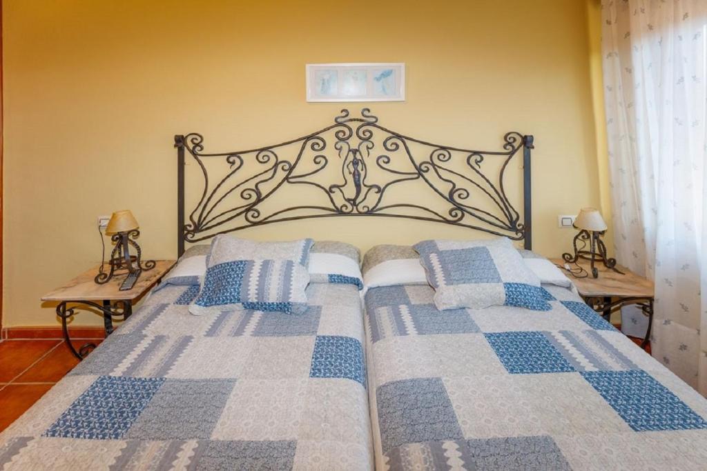 Postel nebo postele na pokoji v ubytování Apartamentos Trébede