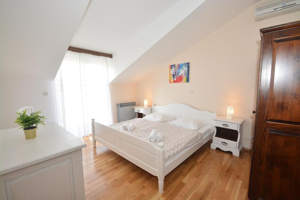 Posteľ alebo postele v izbe v ubytovaní Guesthouse Kamen Kuća