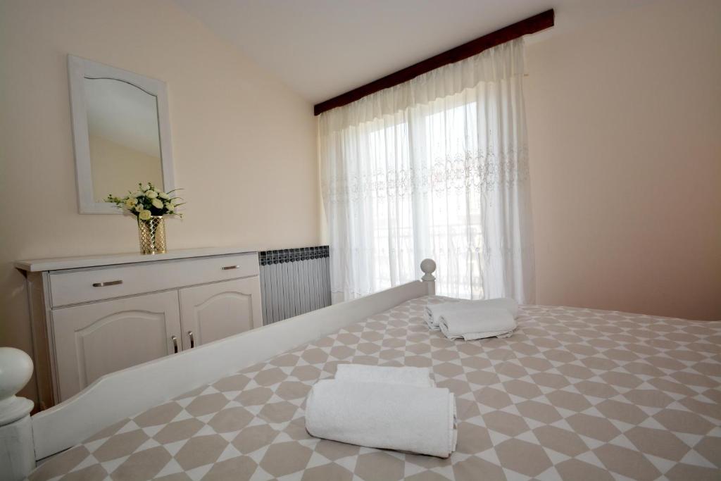 Posteľ alebo postele v izbe v ubytovaní Guesthouse Kamen Kuća