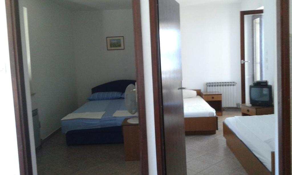 Posteľ alebo postele v izbe v ubytovaní Apartment Sv. Juraj 1