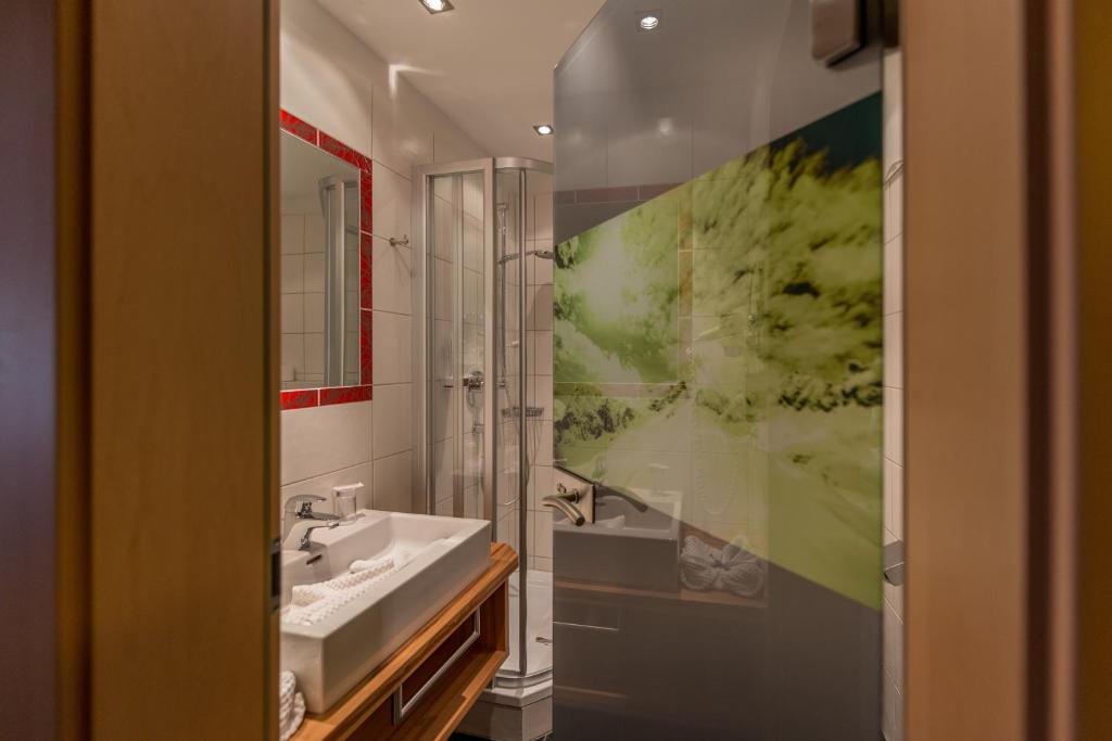 Koupelna v ubytování Hotel Rösslhof