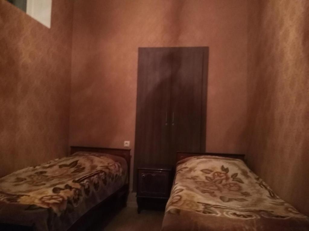 Postel nebo postele na pokoji v ubytování Guest House Gelit