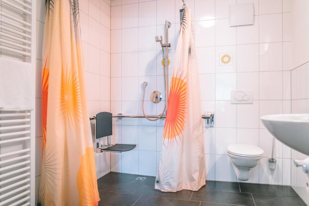 Koupelna v ubytování Hotel Sonne Garni