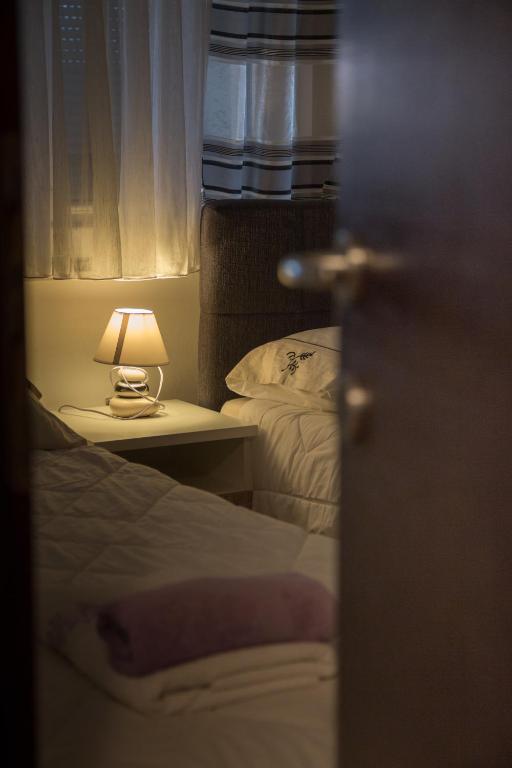 Ліжко або ліжка в номері Apartment Gianluca
