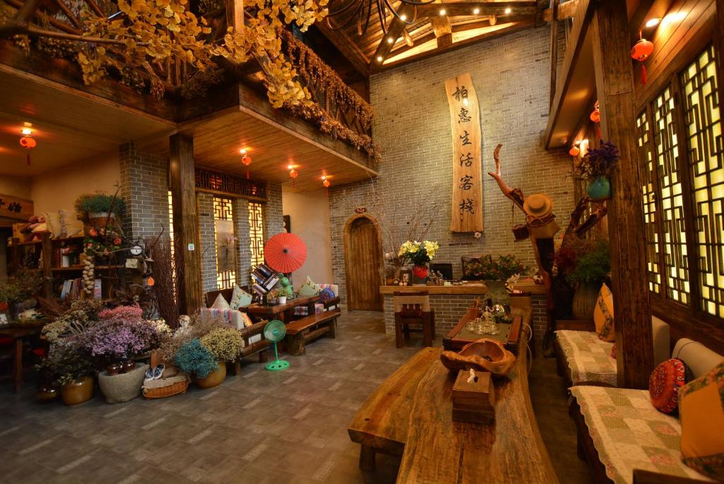 Posezení v ubytování Floral Hotel · Baihui Living Zhangjiajie