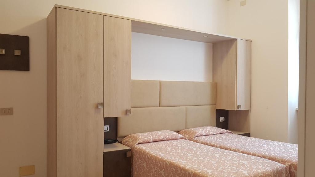 Postel nebo postele na pokoji v ubytování Hotel Eura