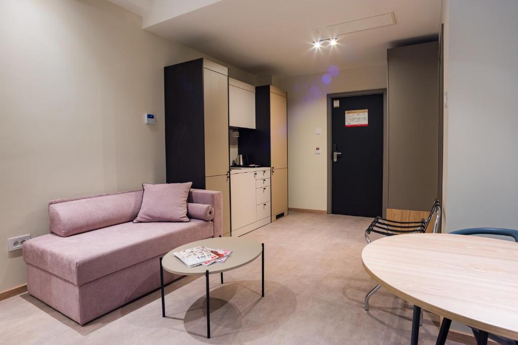 Χώρος καθιστικού στο Hotel Forum Garni