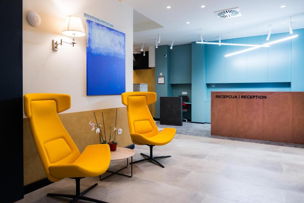 Χώρος καθιστικού στο Hotel Forum Garni