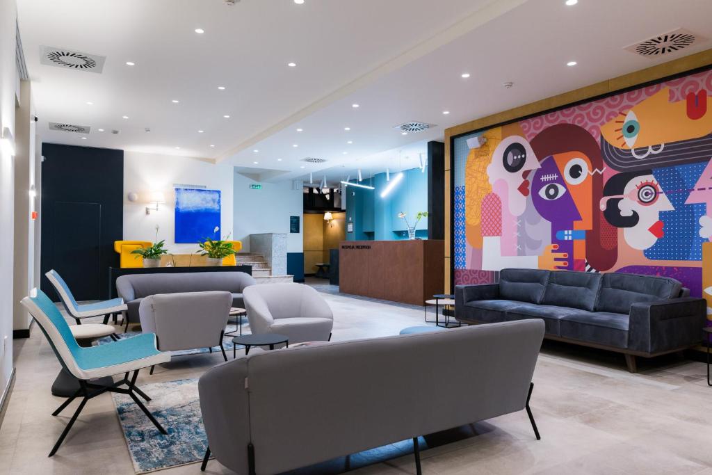 Χώρος καθιστικού στο Hotel Forum Garni