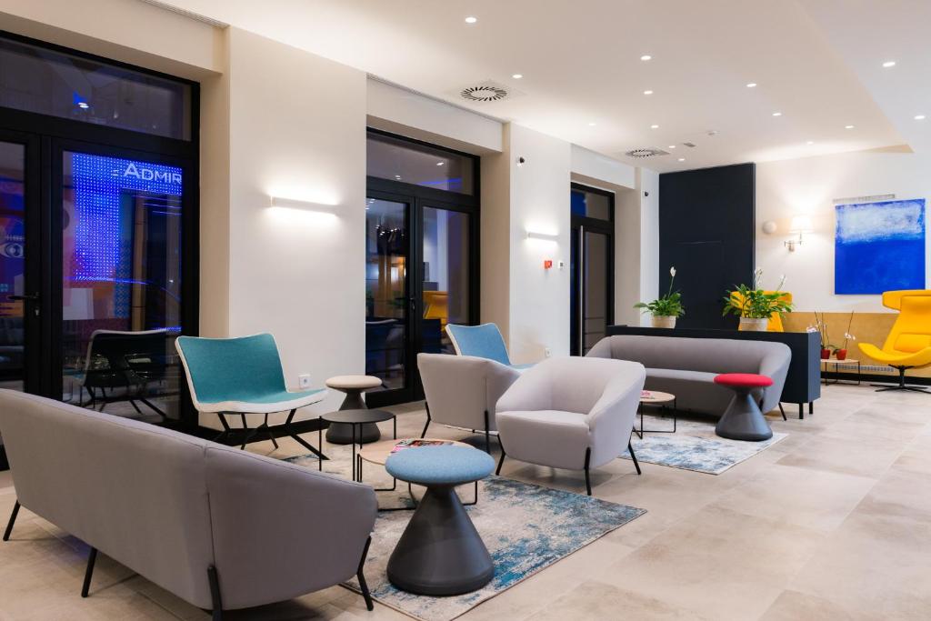 Χώρος καθιστικού στο Hotel Forum Garni