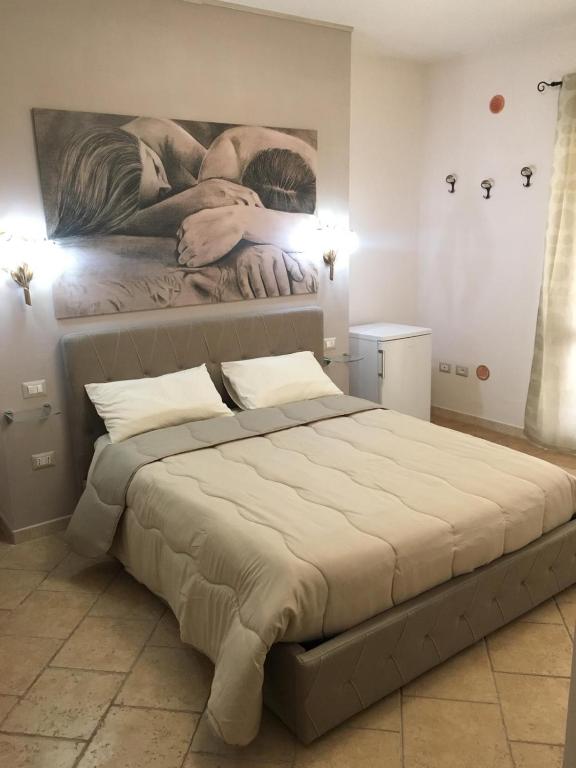 Posteľ alebo postele v izbe v ubytovaní Suite Margarita