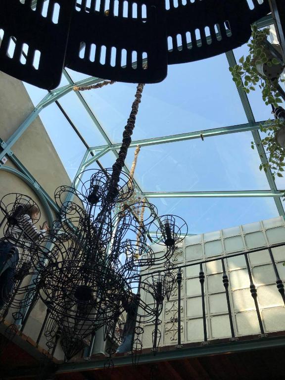 a chandelier hanging from the ceiling of a building at Sennong Homestay in Tainan